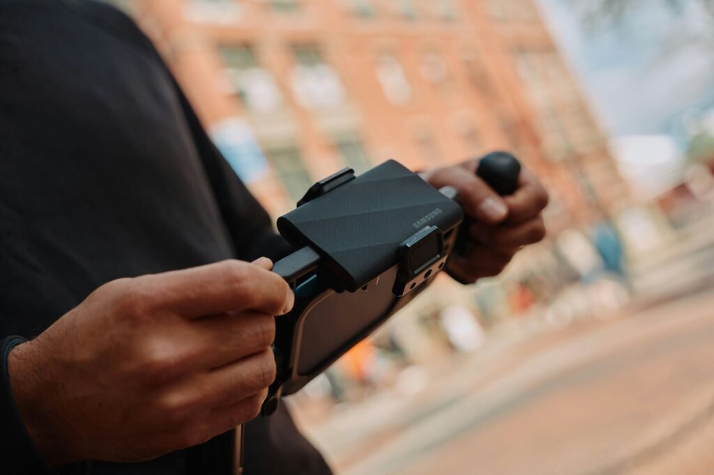 A man holding a cell phone in his hand